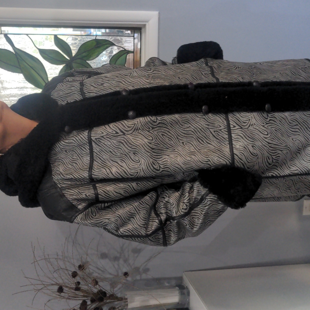Leather parka lined with real fur hoodie.